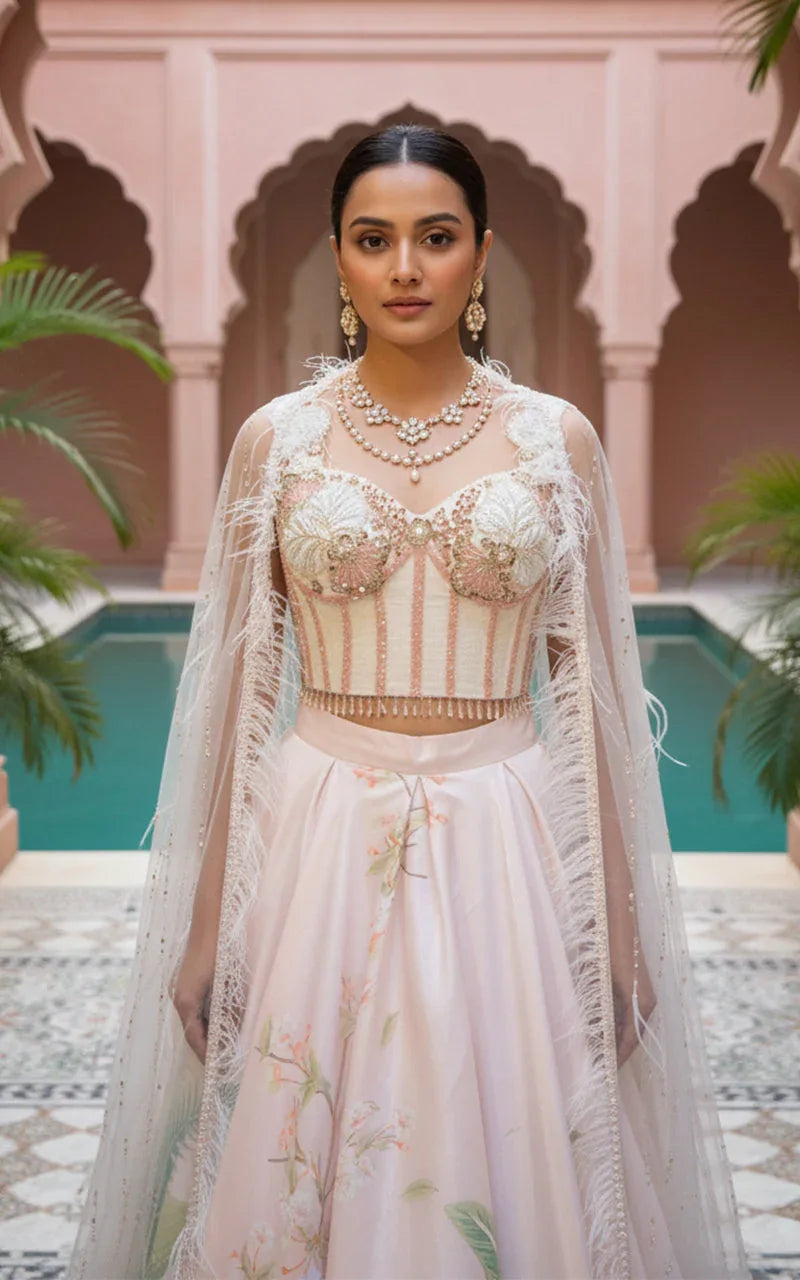 Embellished Blouse With Cape And Printed Lehenga